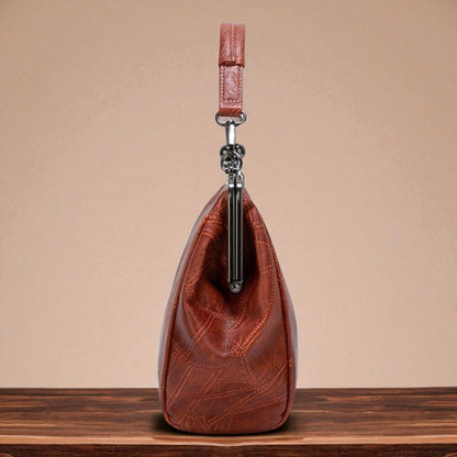 Bolso vintage con chiusura de scatto
