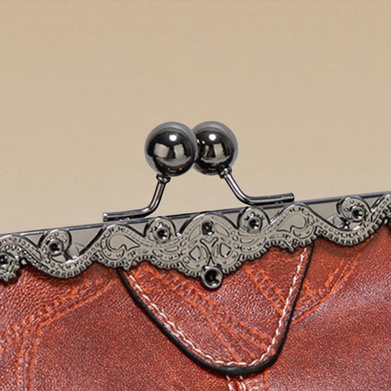 Bolso vintage con chiusura de scatto