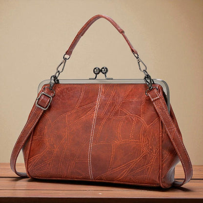 Bolso vintage con chiusura de scatto