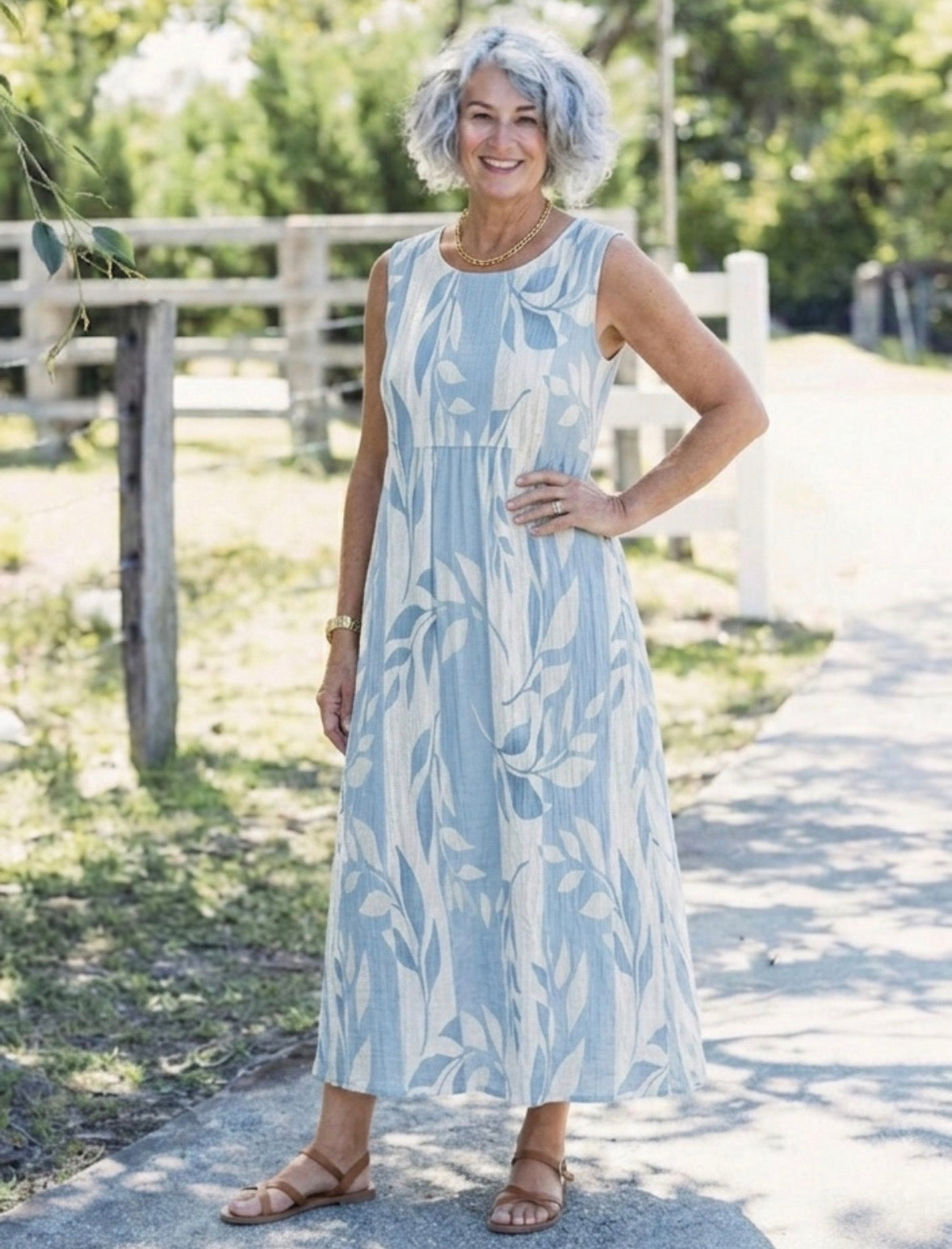 Solene - Vestido midi sin mangas con estampado de hojas azules