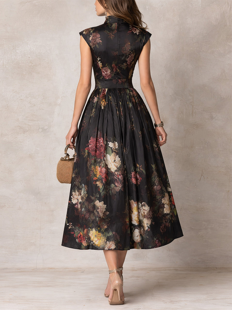 Violetta - Vestido midi negro de satén plisado con estampado floral y escote lágrima