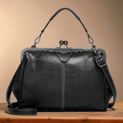 Bolso vintage con chiusura de scatto