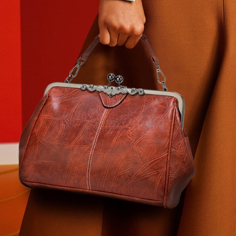 Bolso vintage con chiusura de scatto