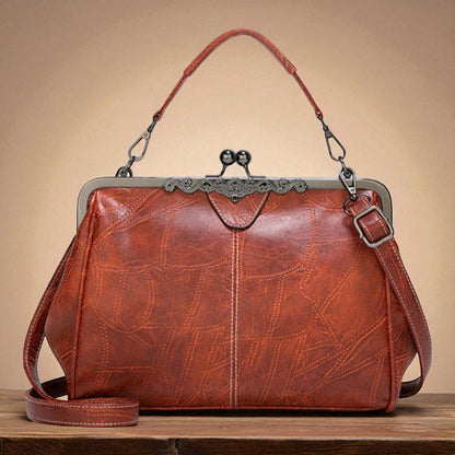 Bolso vintage con chiusura de scatto