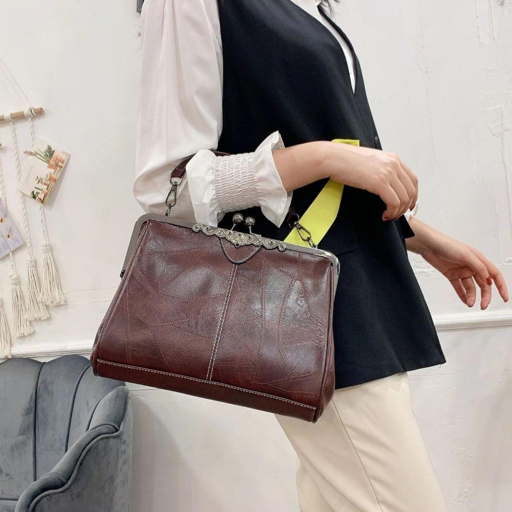 Bolso vintage con chiusura de scatto