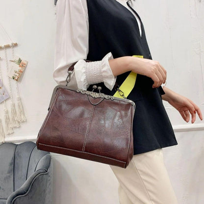 Bolso vintage con chiusura de scatto