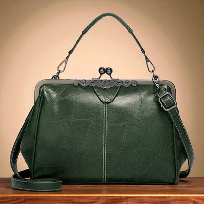 Bolso vintage con chiusura de scatto