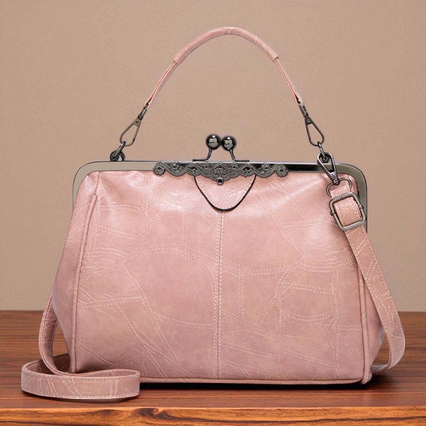 Bolso vintage con chiusura de scatto