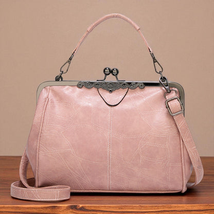 Bolso vintage con chiusura de scatto